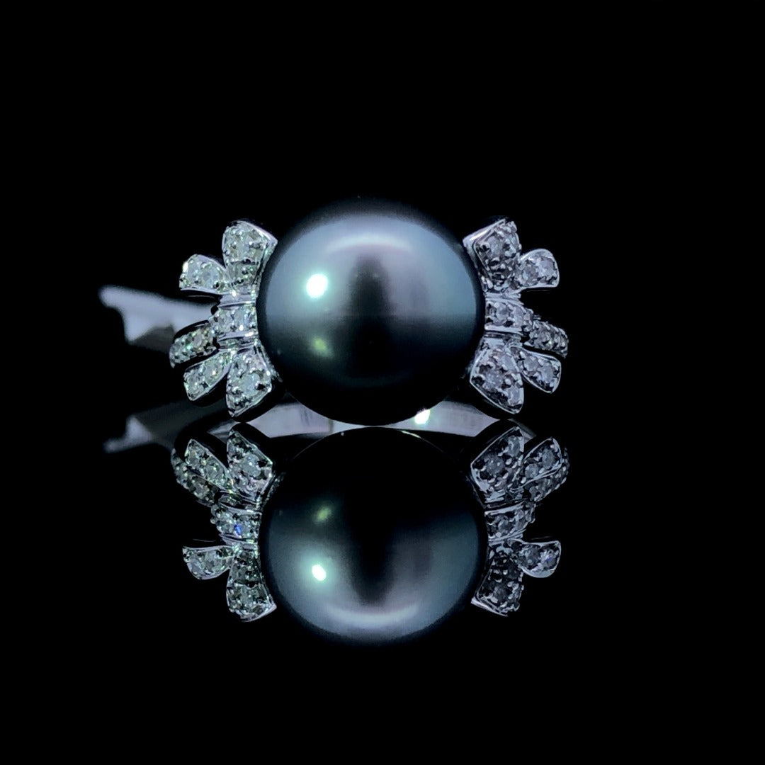 160415 - .18 ctw diamond and pearl ring