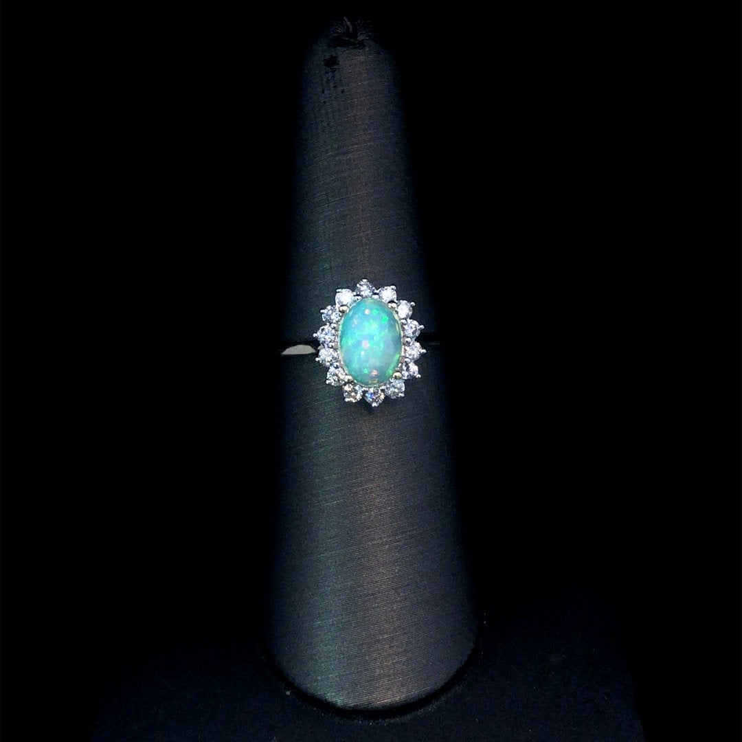 164135 - .60 ctw opal and diamond ring
