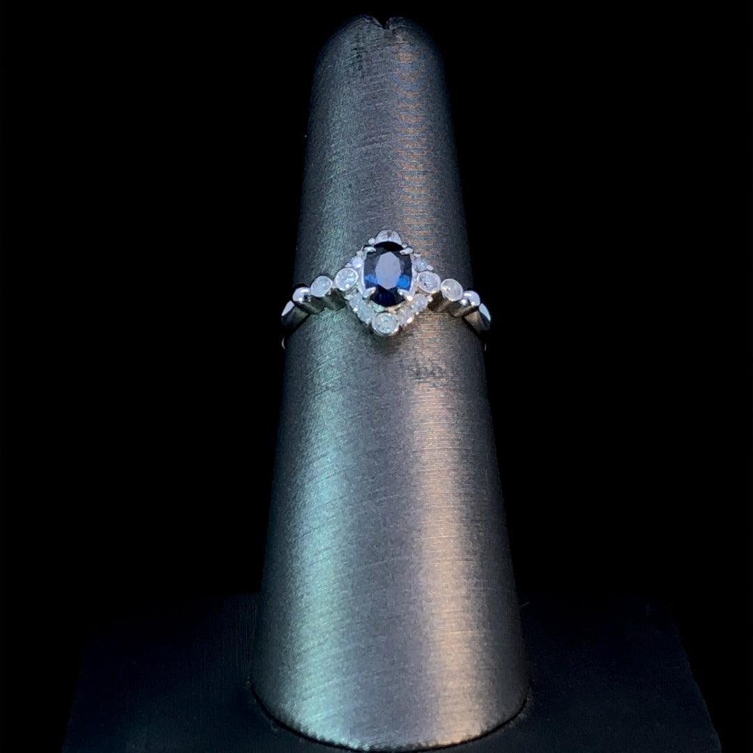 158919 - .68 ctw sapphire and diamond ring