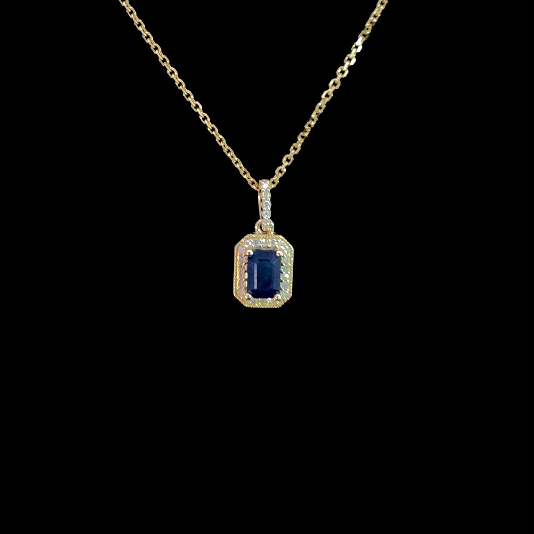 164038 - .87 ctw sapphire and diamond pendant