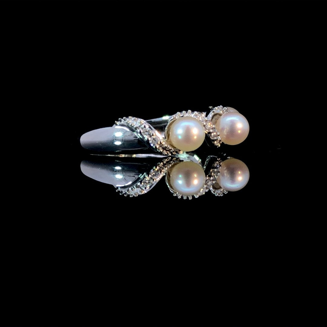 163644 - .10 ctw diamond and pearl ring