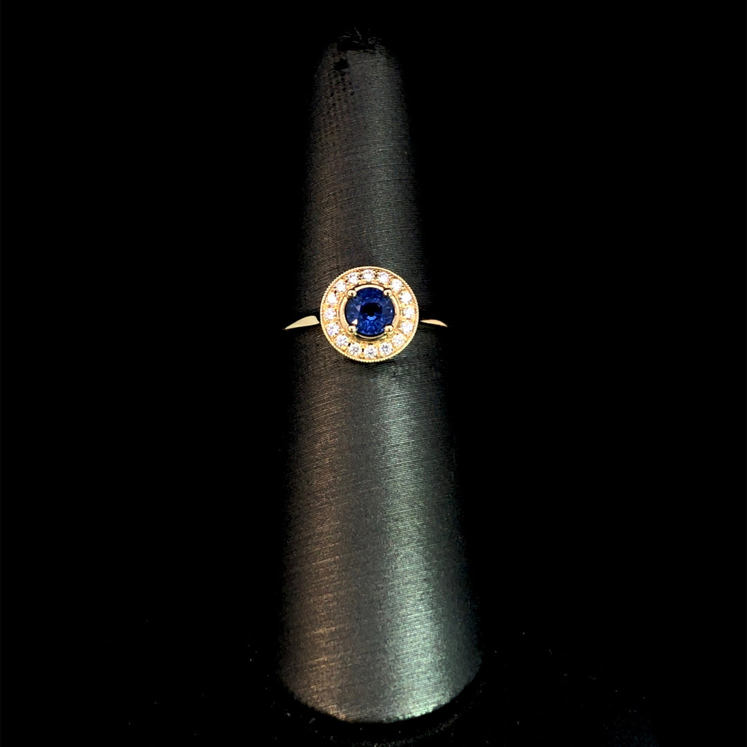 164650 - .56 ctw sapphire and diamond ring