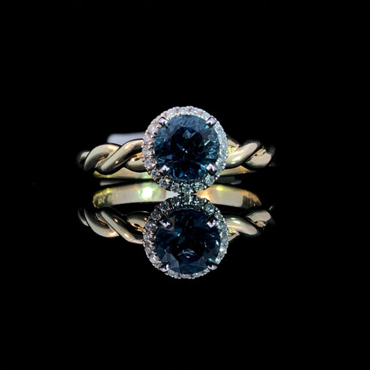 162890 - .08 ctw blue topaz and diamond ring