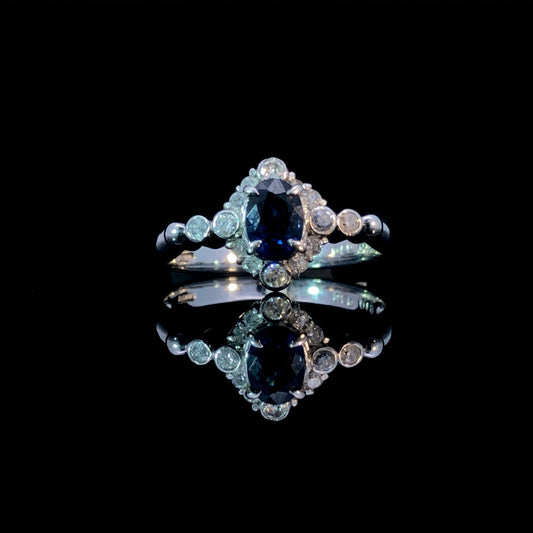 158919 - .68 ctw sapphire and diamond ring