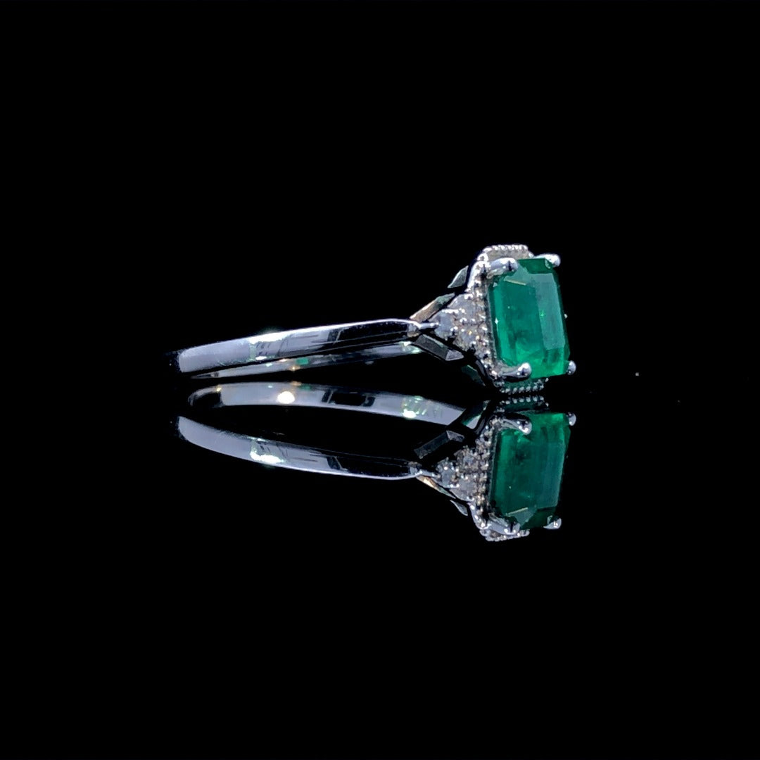 163447 - .71 ctw emerald and diamond ring