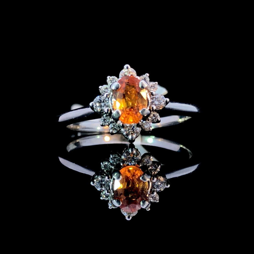 159585 - .22 ctw spessartite garnet and diamond ring