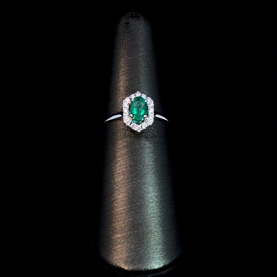 163234 - .58 ctw emerald and diamond ring