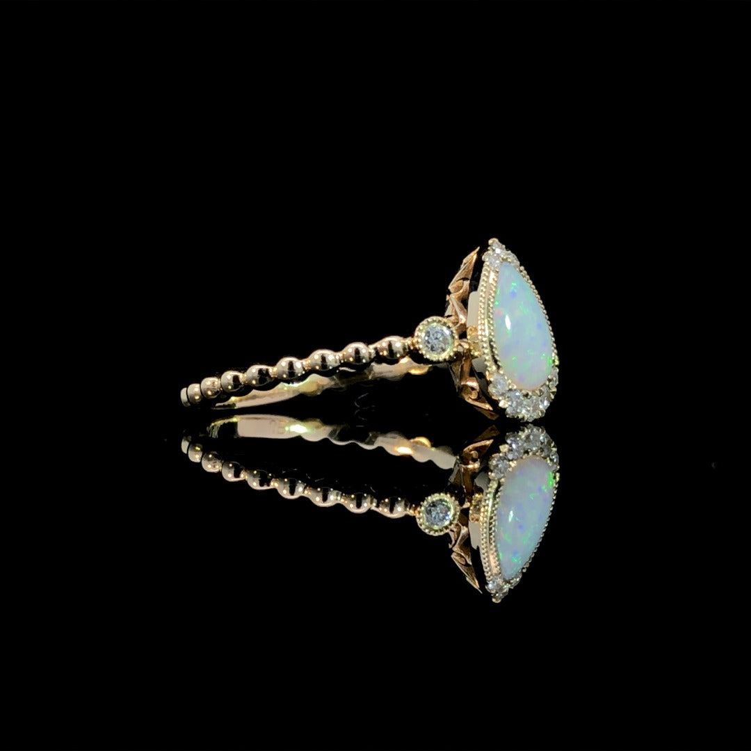 163324 - .56 ctw opal and diamond ring
