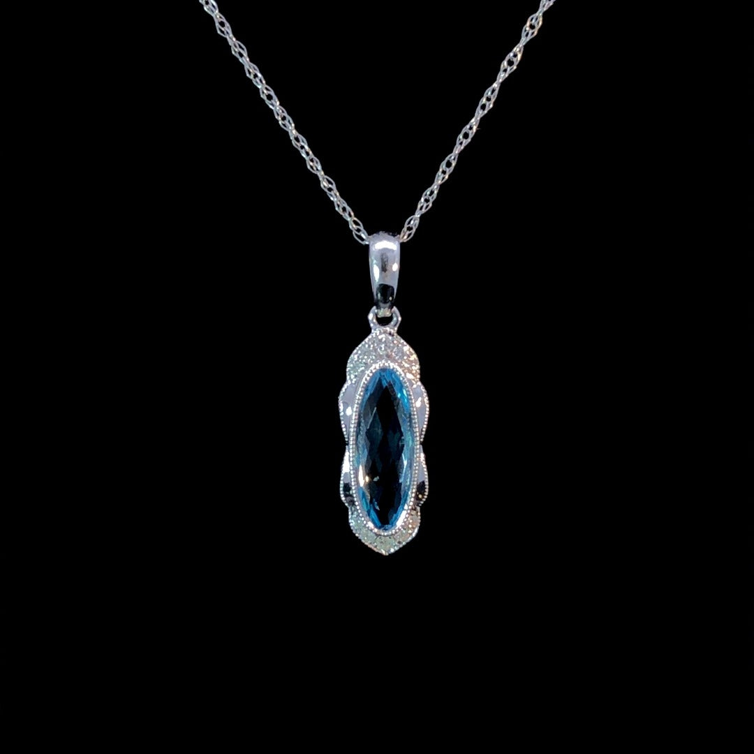 163381 - 1.44 ctw blue topaz and diamond pendant