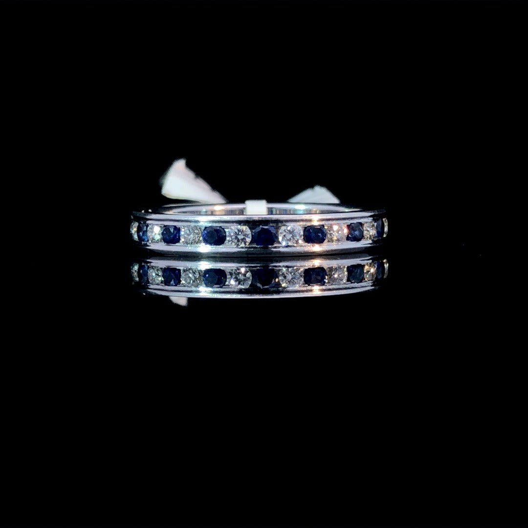 120343 - .68 ctw diamond and sapphire band