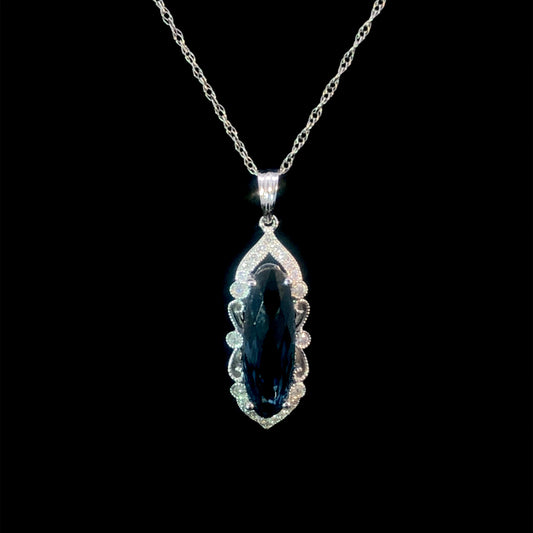 158238 - 3.06 ctw blue topaz and diamond pendant