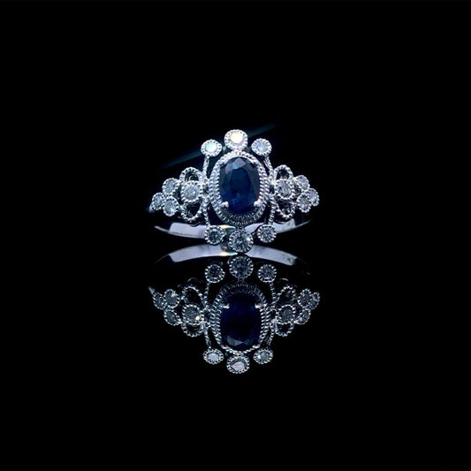 164144 - .65 ctw sapphire and diamond ring