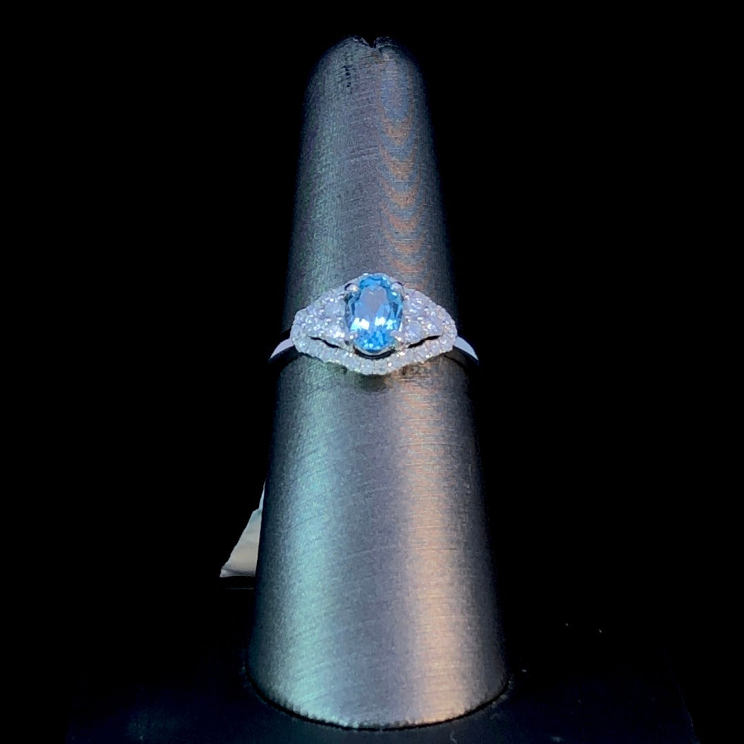 148168 - .46 ctw diamond and blue topaz ring