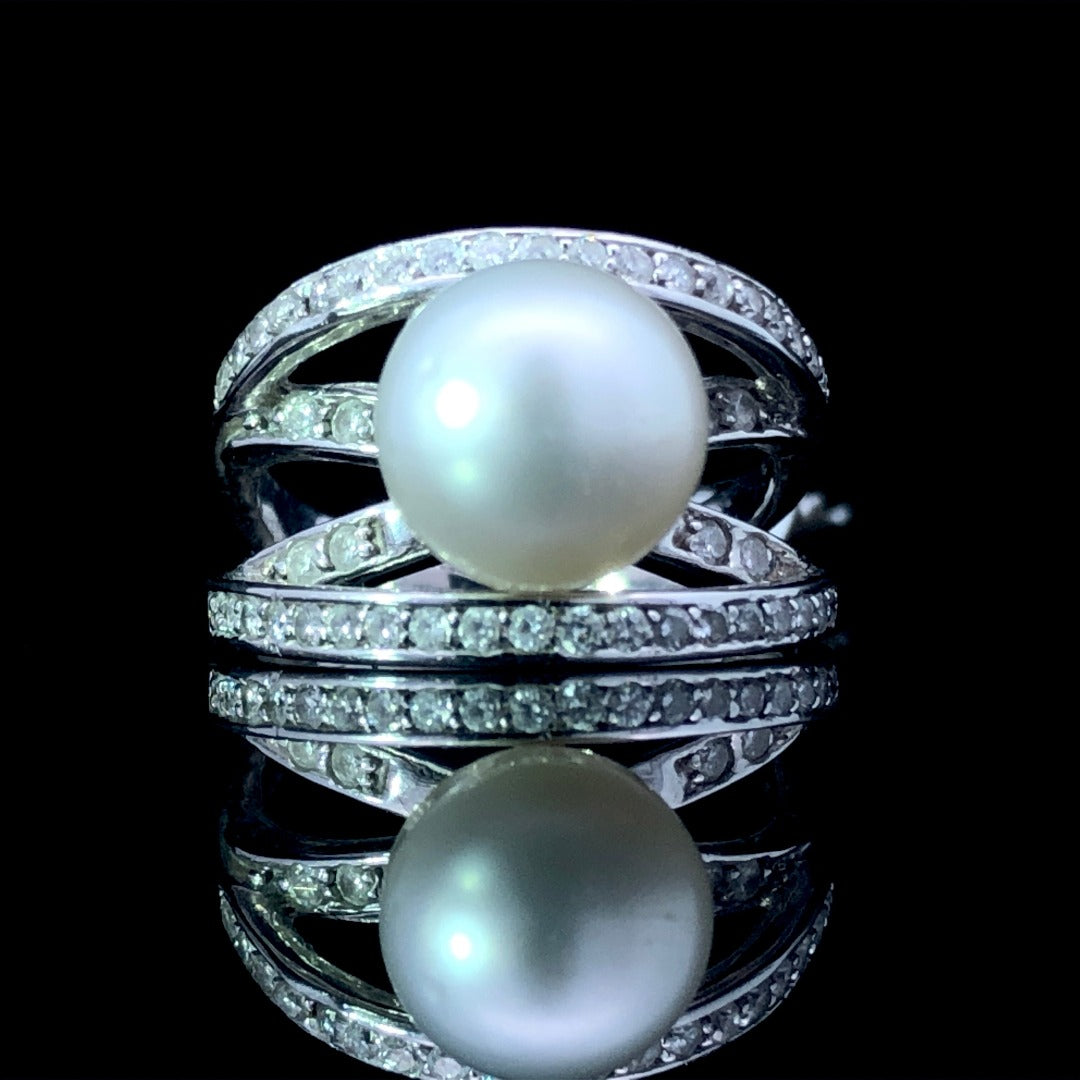 154482 - .45 ctw diamond and pearl ring
