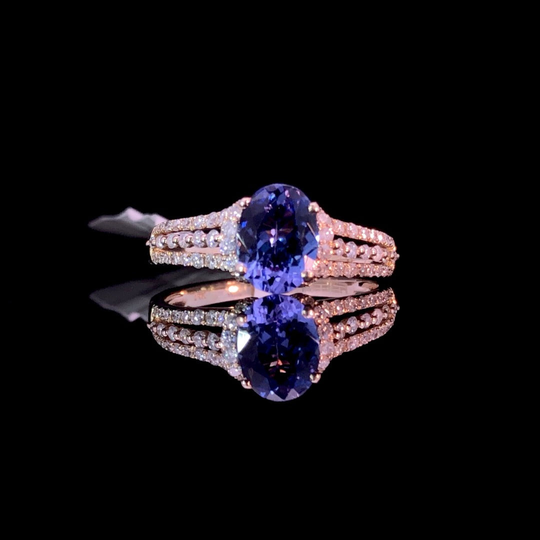 160366 - 1.55 ctw diamond and tanzanite ring