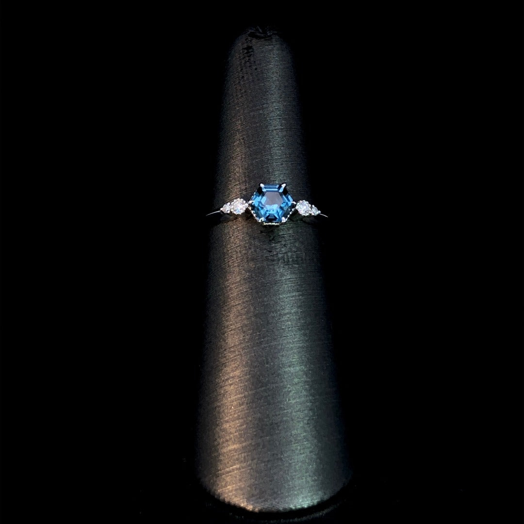 163346 - .72 ctw blue topaz and diamond ring