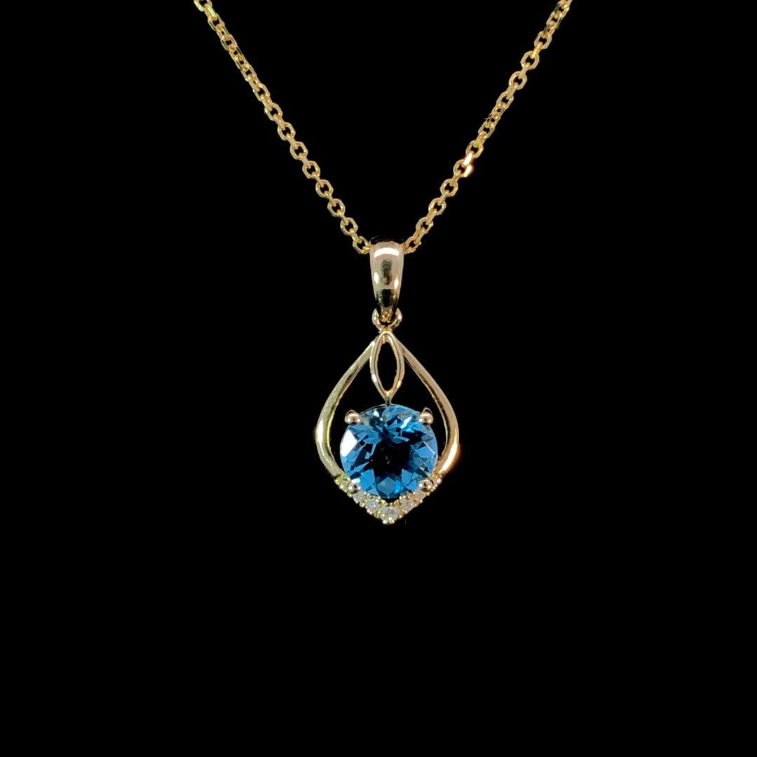 163374 - 1.48 ctw blue topaz and diamond pendant