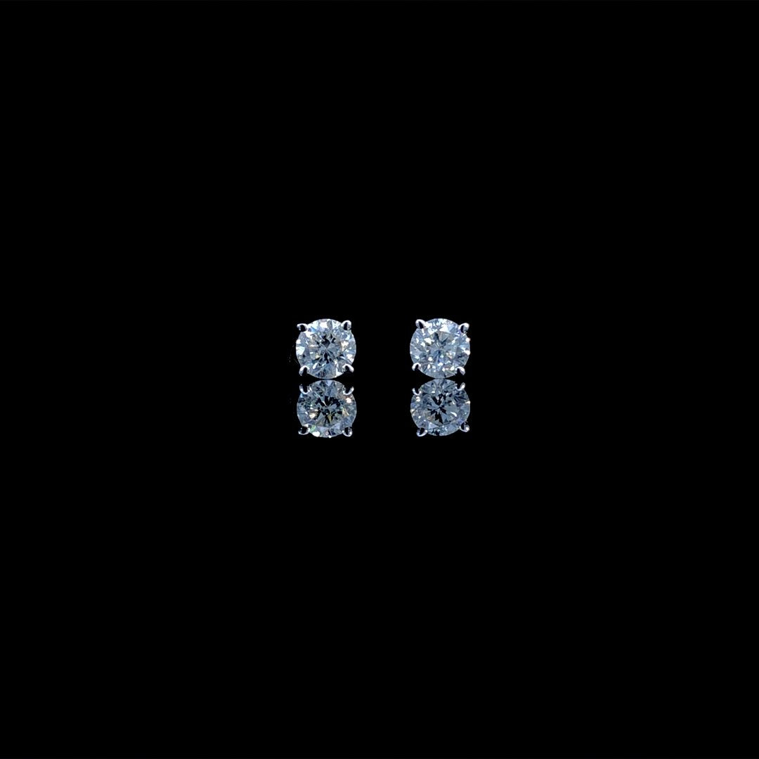 164189 - .64 ctw diamond studs