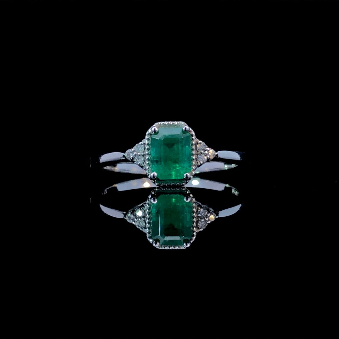 163447 - .71 ctw emerald and diamond ring