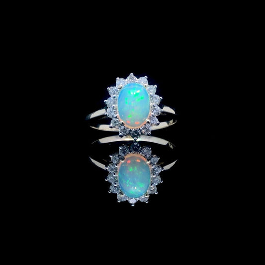 164135 - .60 ctw opal and diamond ring