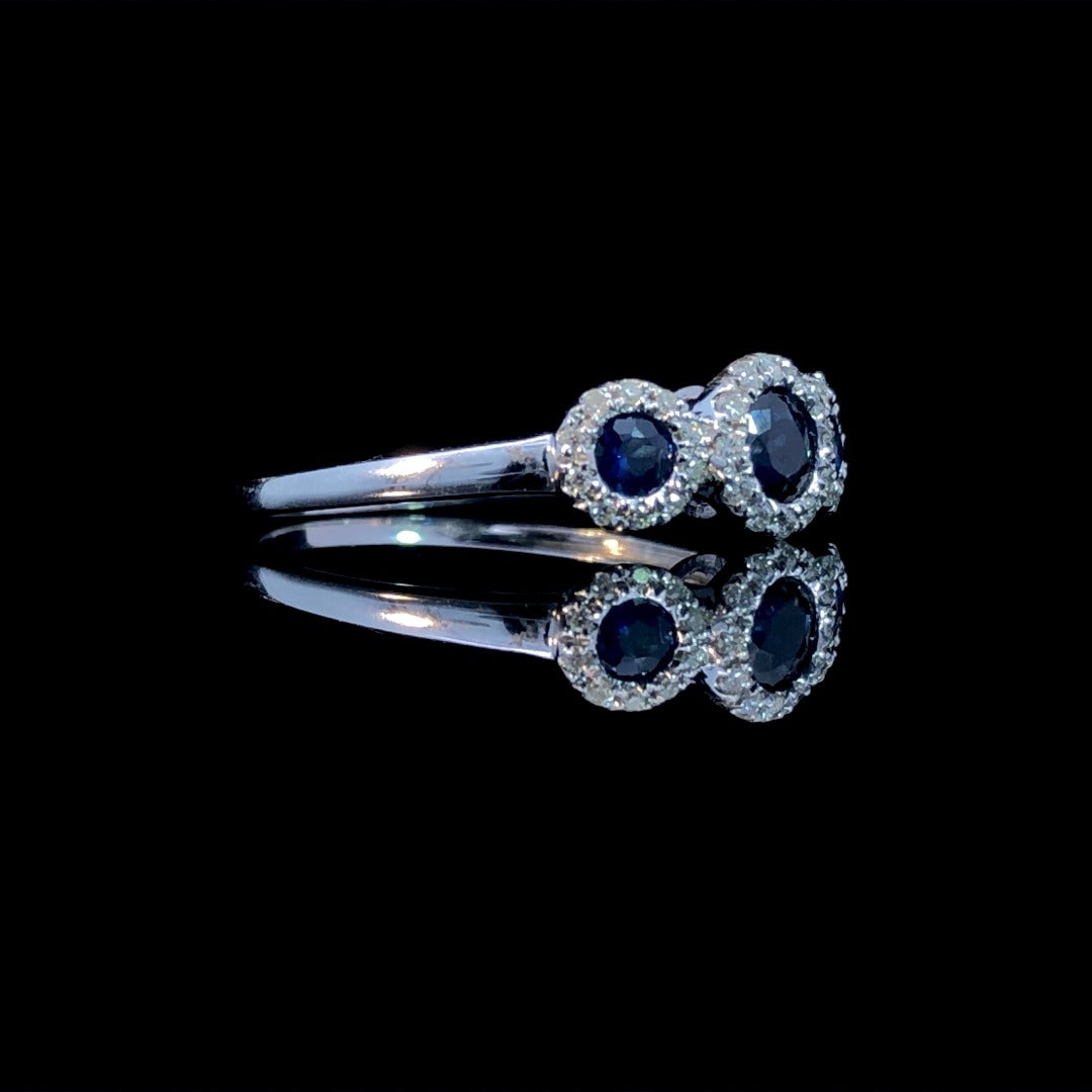 163299 - .73 ctw sapphire and diamond ring