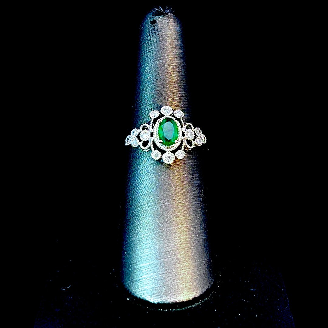 164142 - .65 ctw emerald and diamond ring