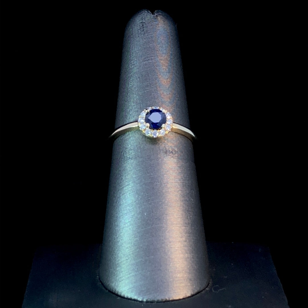 152991 - .64 ctw sapphire and diamond ring