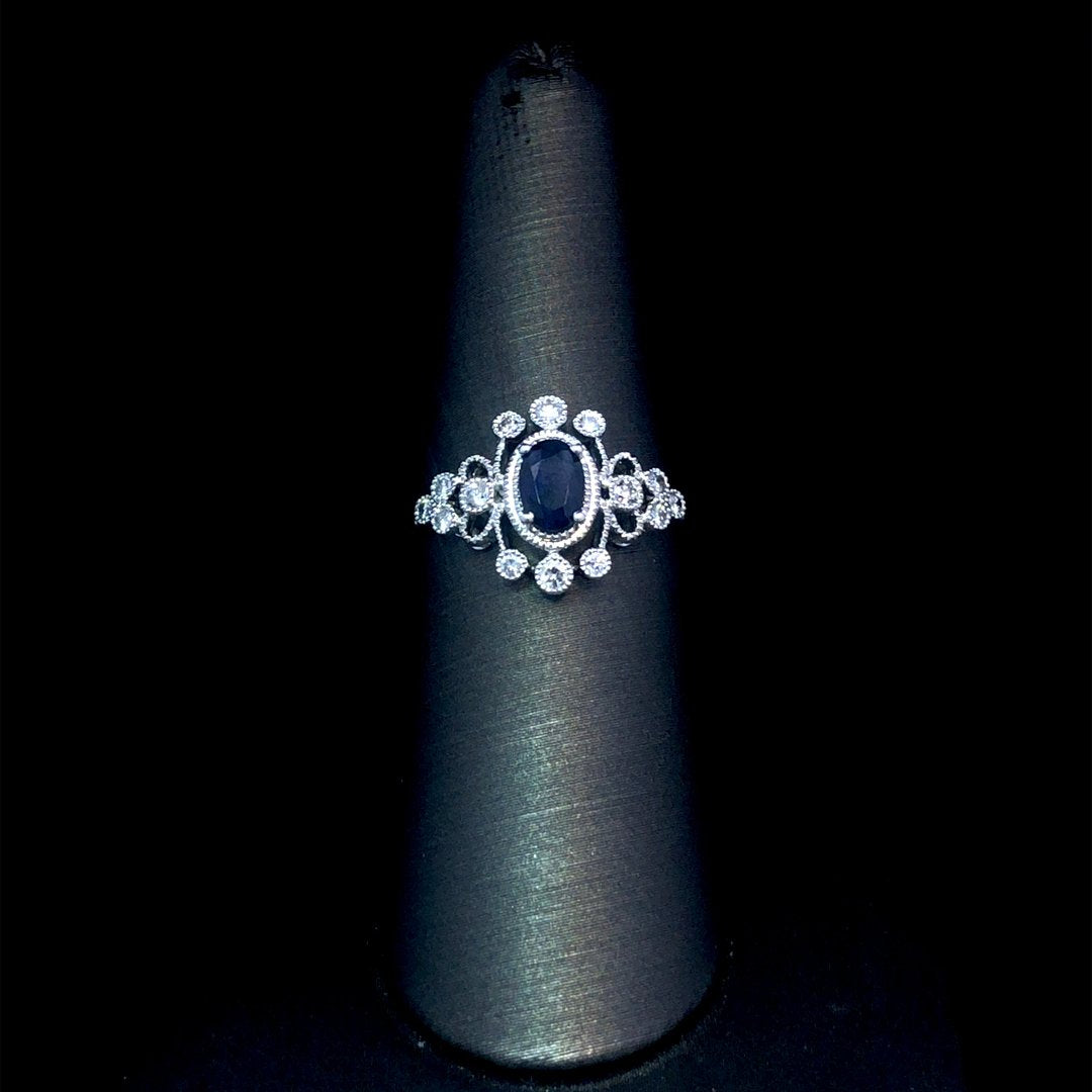 164144 - .65 ctw sapphire and diamond ring