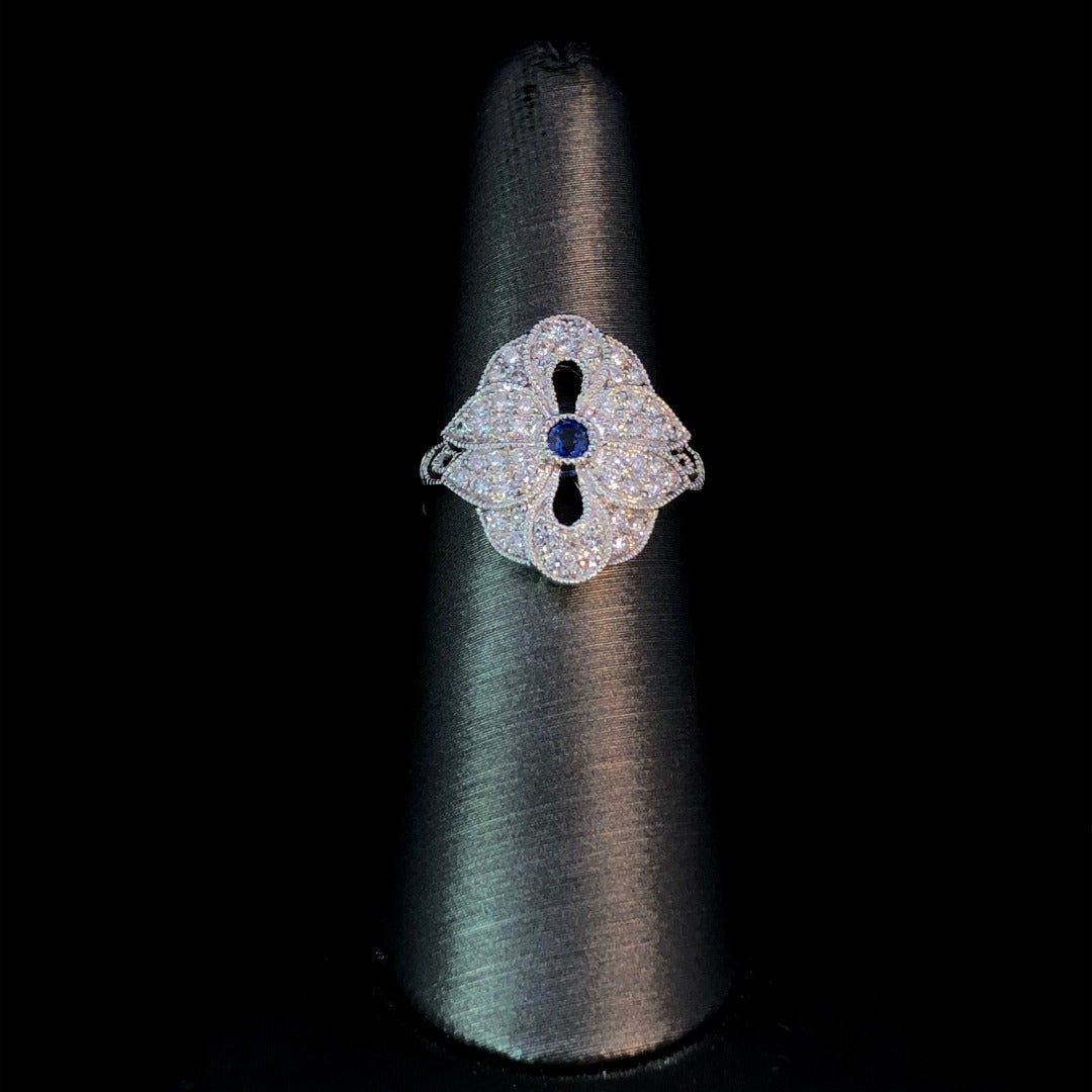 159975 - .63 ctw sapphire and diamond ring