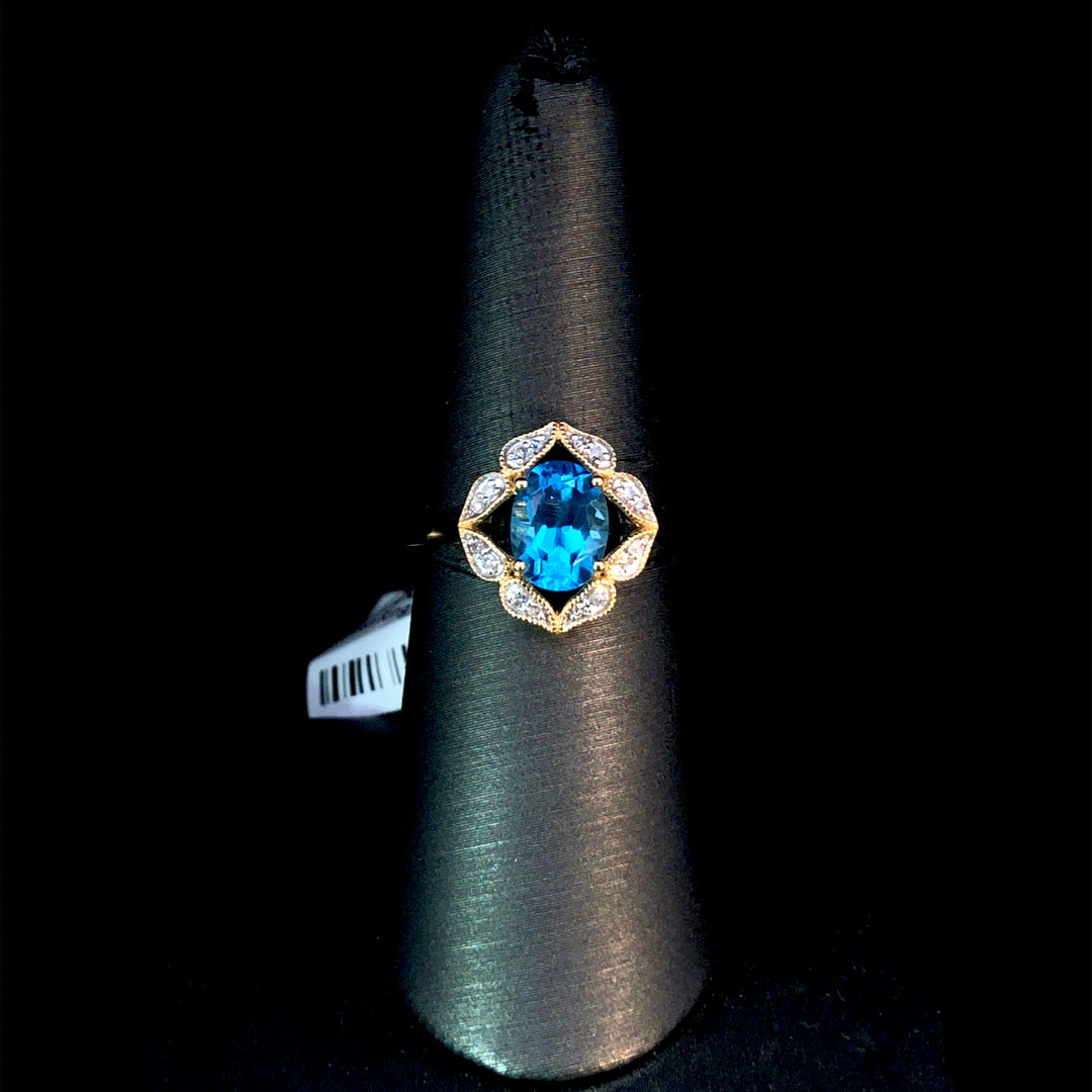 166137 - blue topaz and diamond ring