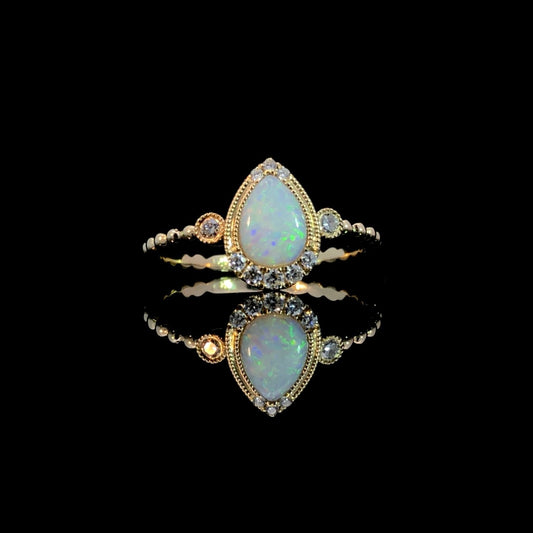 163324 - .56 ctw opal and diamond ring