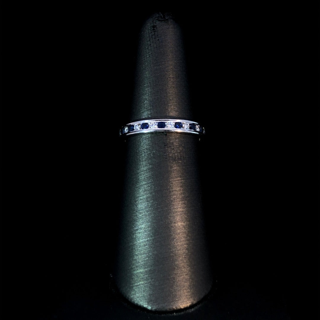 120343 - .68 ctw diamond and sapphire band