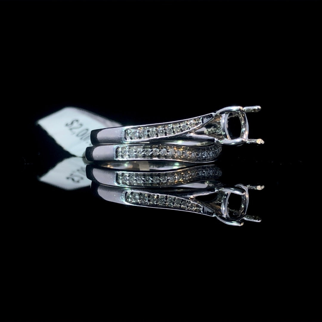 146510 - .22 ctw diamond and sapphire ring
