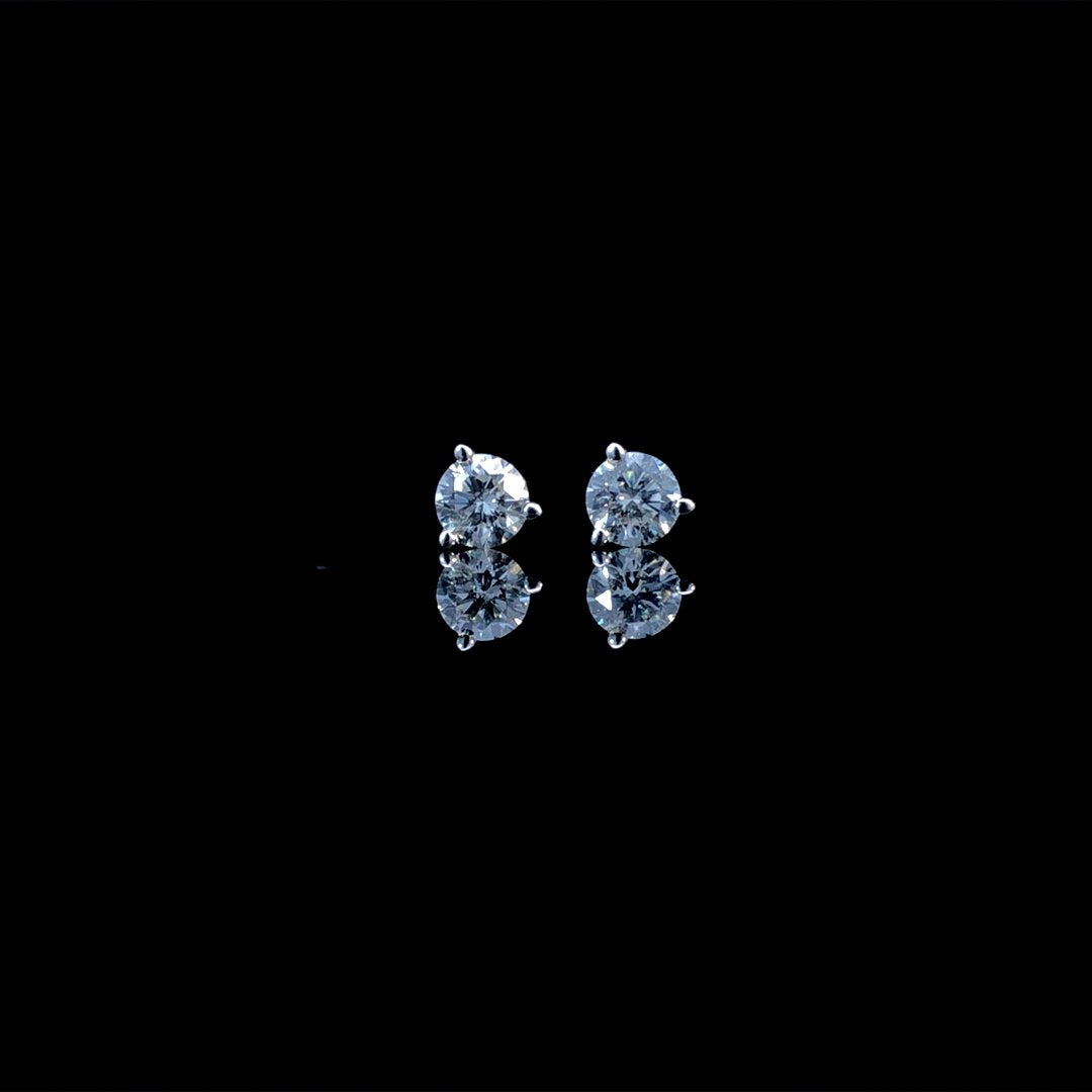 164190 - .74 ctw diamond studs