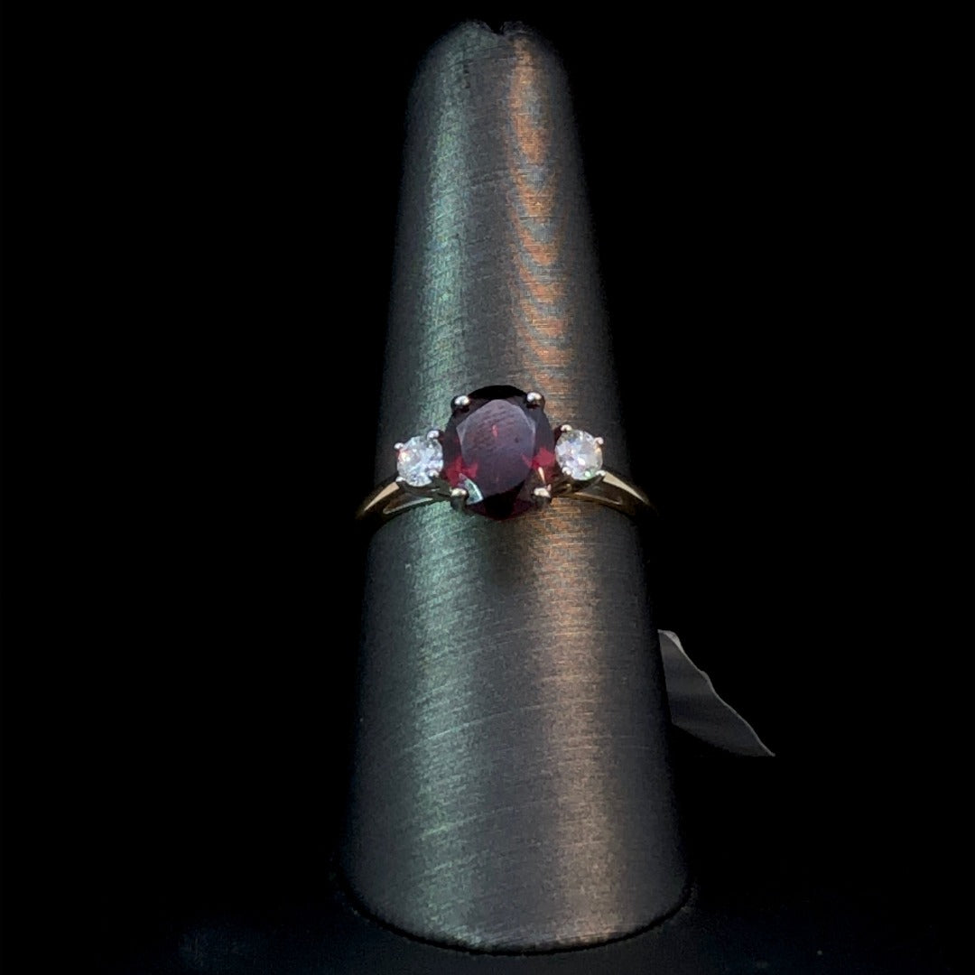 139289 - .28 ctw Garnet and diamond ring