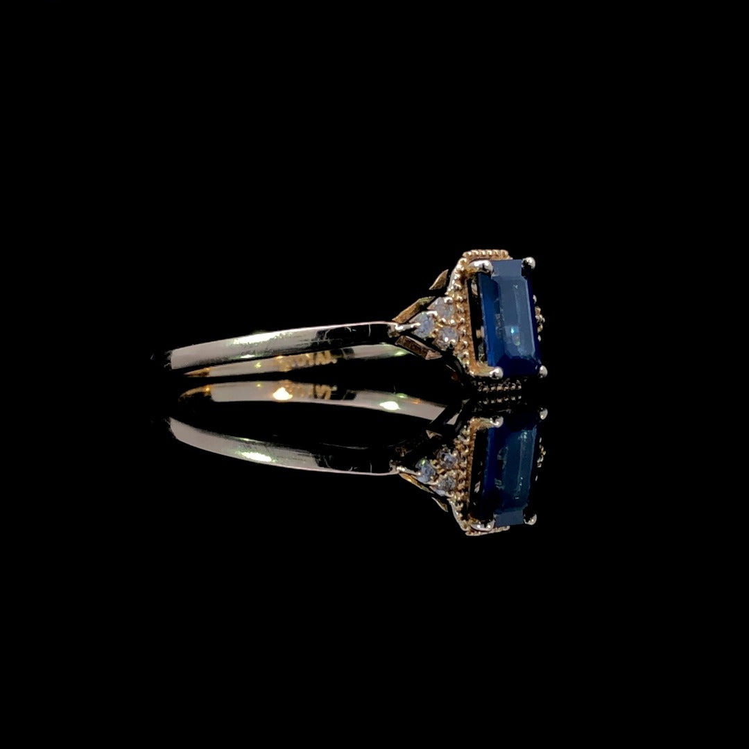163448 - .66 ctw sapphire and diamond ring
