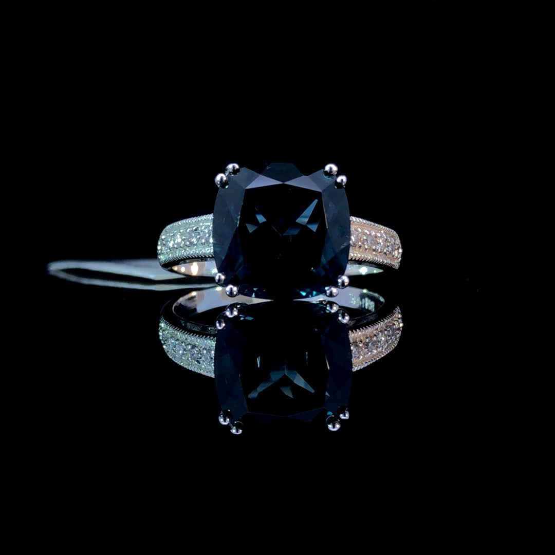 4.26 ctw blue topaz and diamond ring