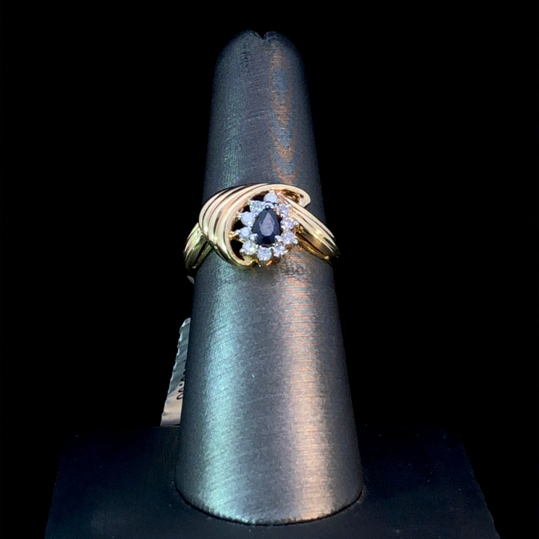 115326 - .20 ctw diamond and 3x5 mm sapphire ring