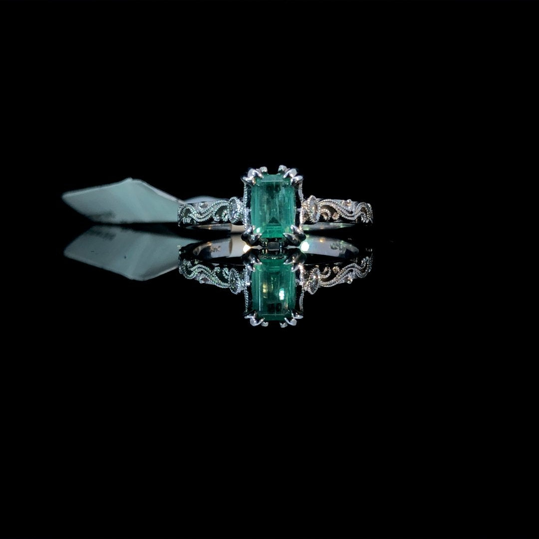 162889 - .56 ctw emerald and diamond ring