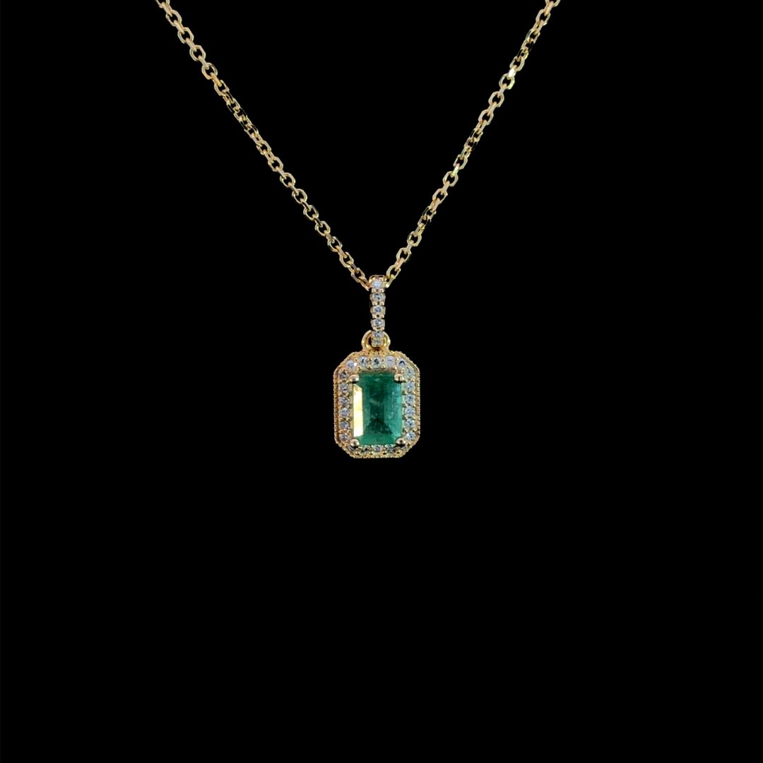 164040 - .87 ctw emerald and diamond pendant