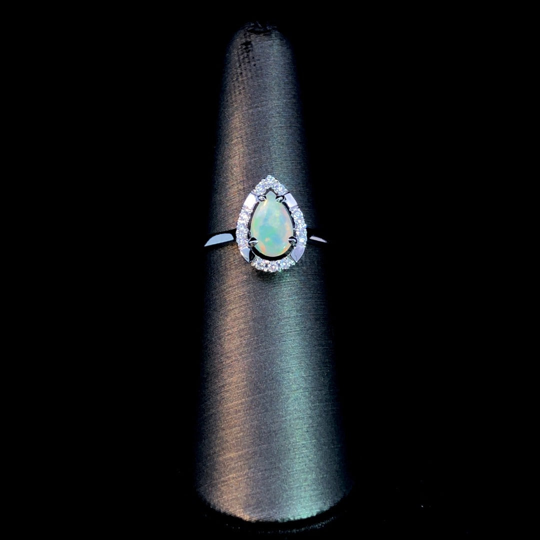 163225 - .45 ctw diamond and opal ring