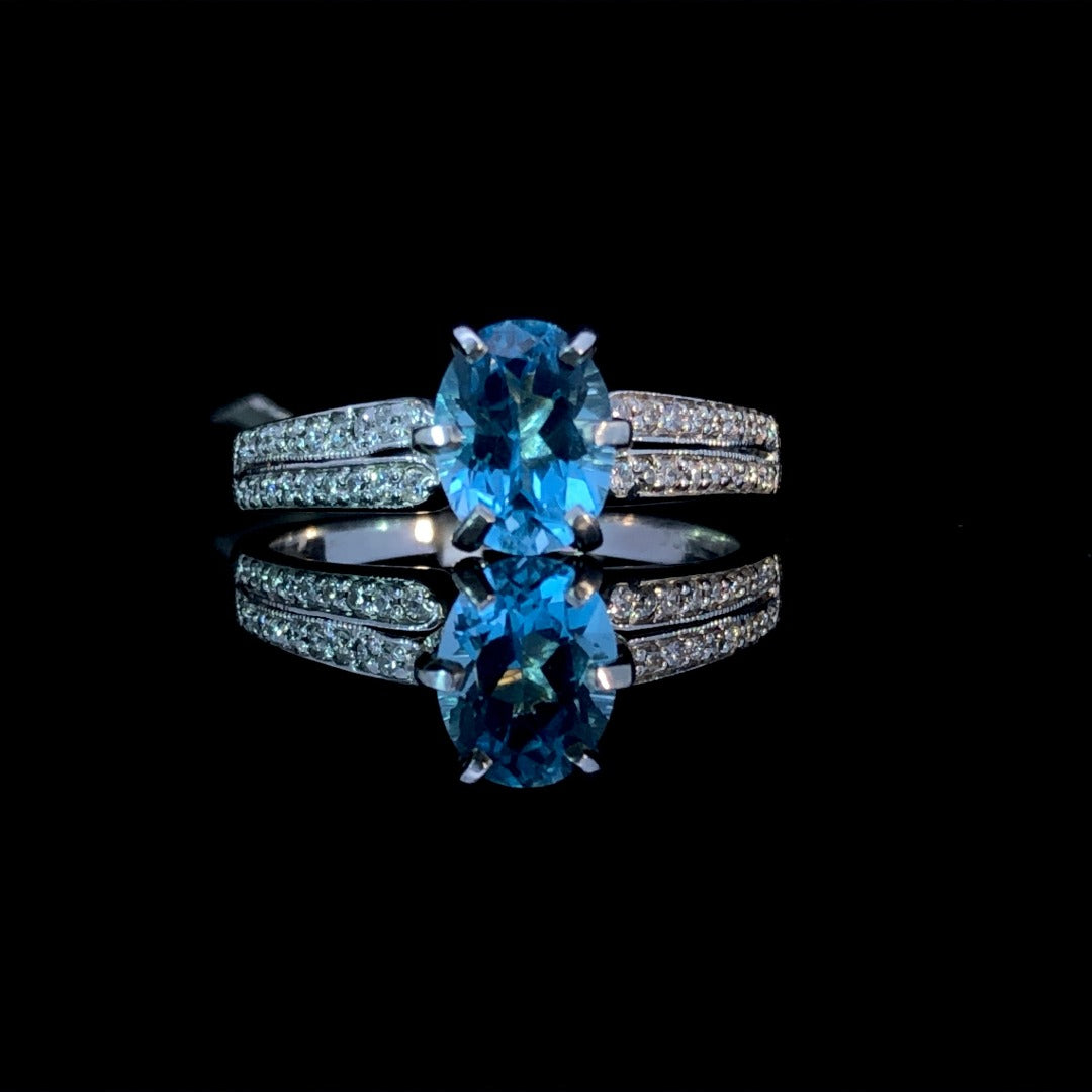 159653 - .20 ctw Diamond and blue topaz ring