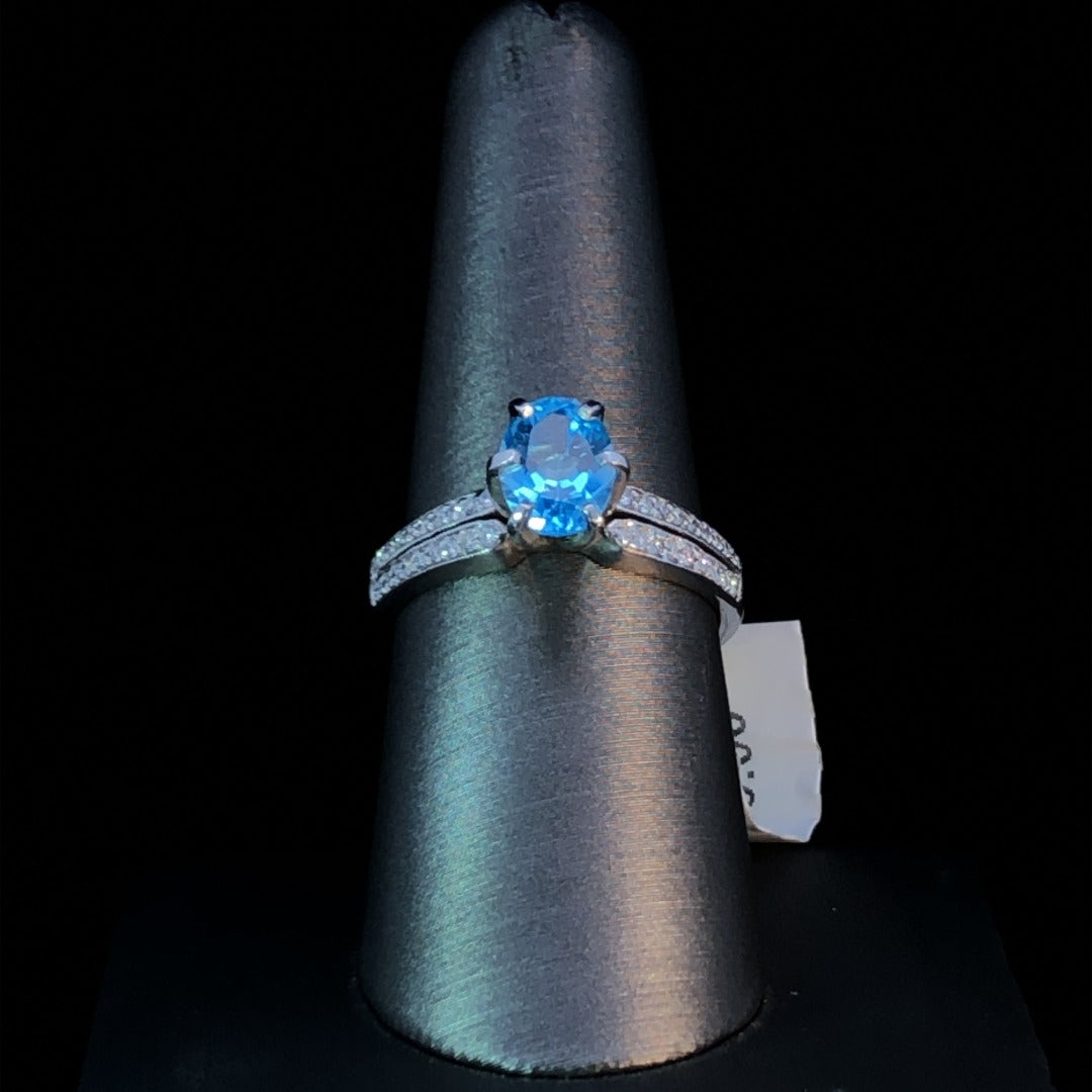 159653 - .20 ctw Diamond and blue topaz ring