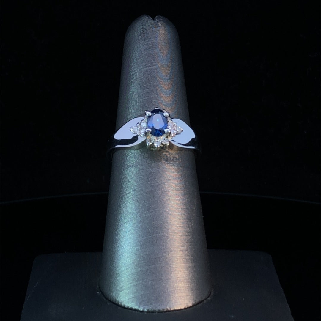 118909 - .15 ctw sapphire and diamond ring