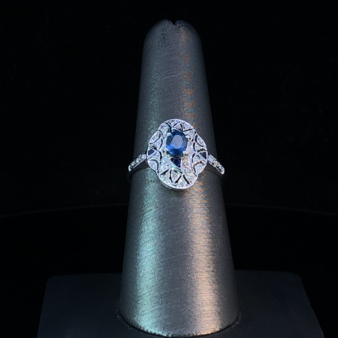 137755 - .72 ctw Sapphire and Diamond Ring