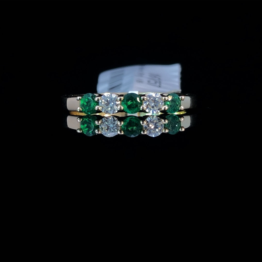 160757 - .50 ctw diamond and emerald band