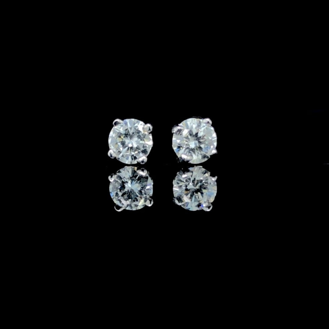 138838 - .59 ctw diamond stud earrings