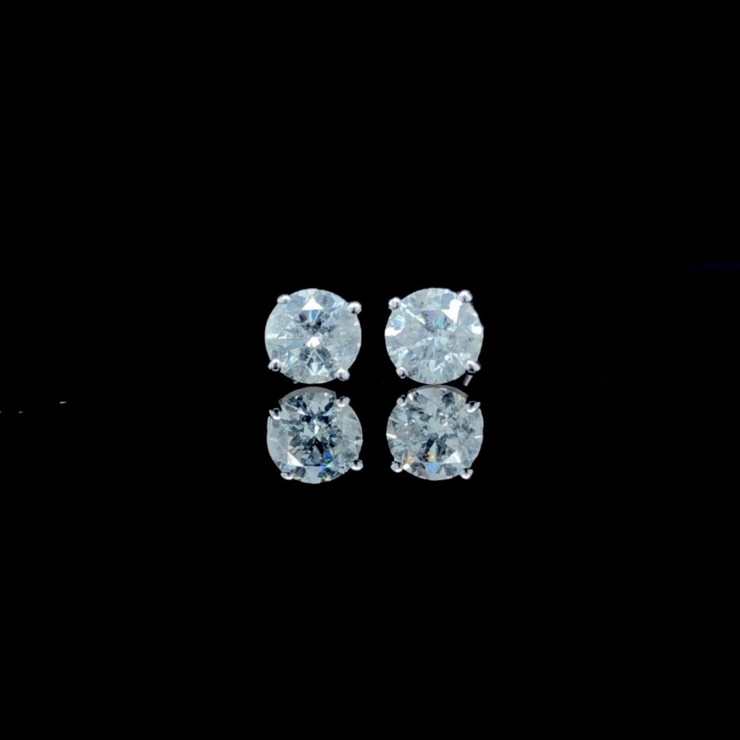 156877 - .52 ctw diamond studs
