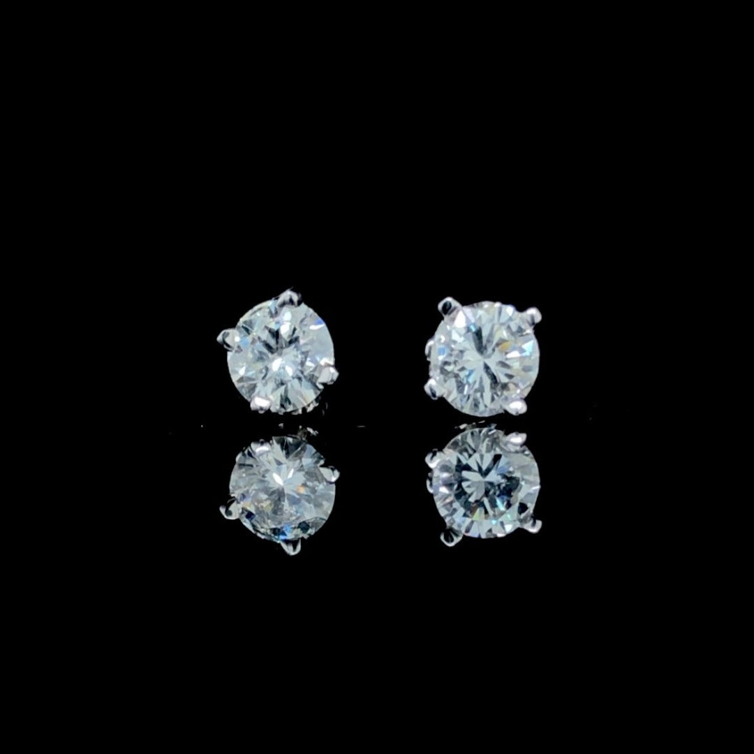 134195 - .65 ctw diamond stud earrings