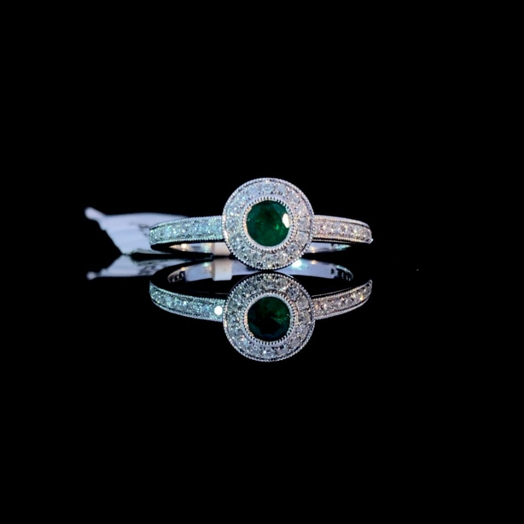 157678 - .51 ctw emerald and diamond ring